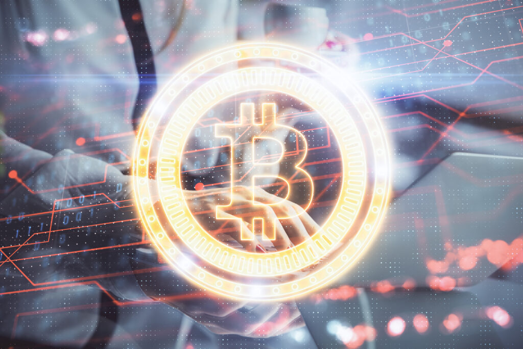 Double exposure of woman hands typing on computer and crypto market theme hologram drawing. blockchain concept.