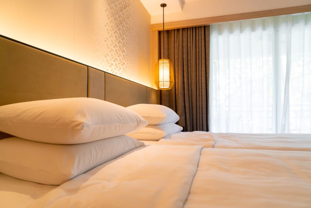 White pillow decoration bed hotel resort bedroom