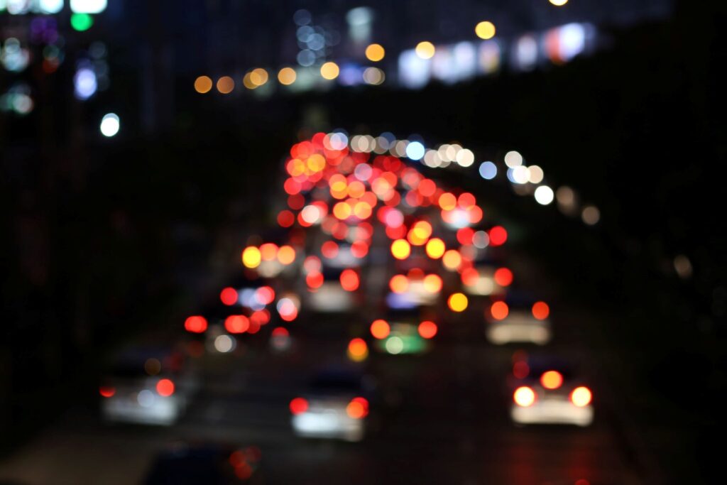 Defocused image vehicles road city night